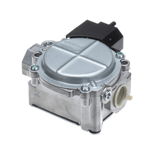 A metallic, box-shaped mechanical component with a round, cross-patterned top cover, several screws, and a black plastic connector on top.
