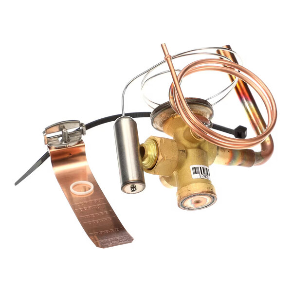 A brass valve assembly with attached copper tubing, a metal cylinder, and a copper strap with a clamp.