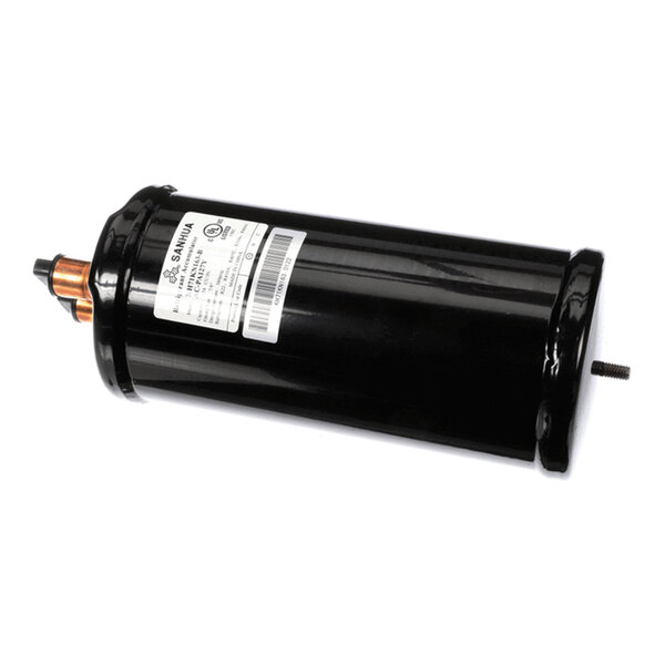 A cylindrical black metal component with a label and copper fittings on one end.