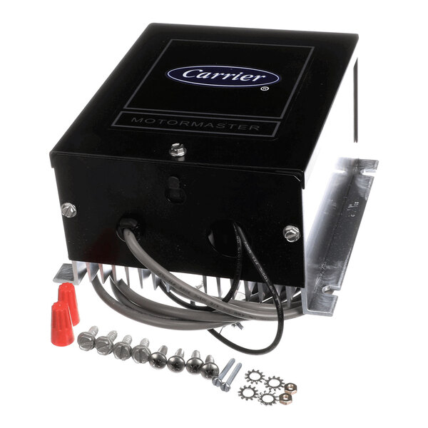 A black rectangular electronic device with wires extending from it, accompanied by screws, washers, and wire connectors, with the label 'Carrier Motormaster' visible on the top.