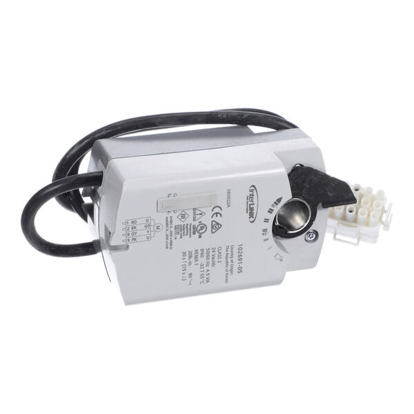 A rectangular metallic device with a black cable, a rotary knob, and a white terminal block attached to one end.