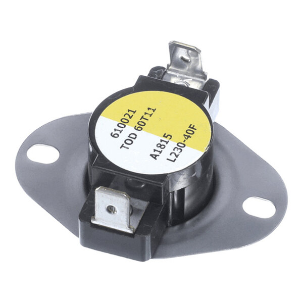 A small round electronic component with two metal terminals and a mounting plate, featuring a yellow and white label with printed text.