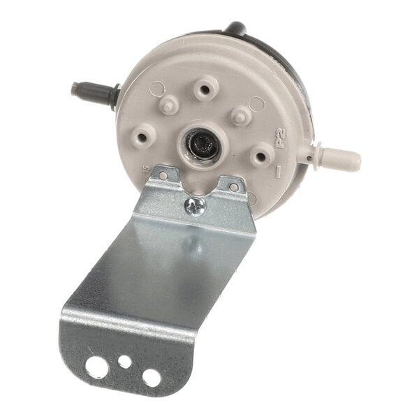 A round, gray pressure switch with multiple ports and a metal mounting bracket attached.
