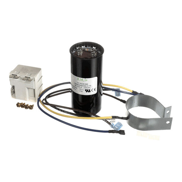 A cylindrical black capacitor with attached wires, a metal mounting bracket, a white relay component, and several screws are arranged on a white background.