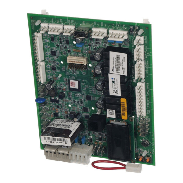 A green electronic circuit board with various components, connectors, and labels attached.