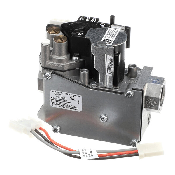 A metallic gas valve assembly with attached wiring and labeled components, featuring adjustment dials and connection ports.