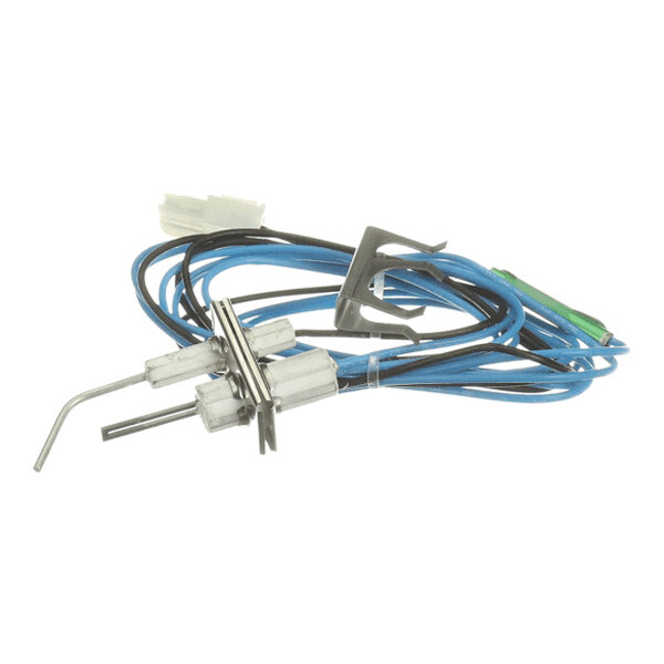 A metal ignitor and flame rod assembly with attached blue and black wires, connectors, and mounting bracket.