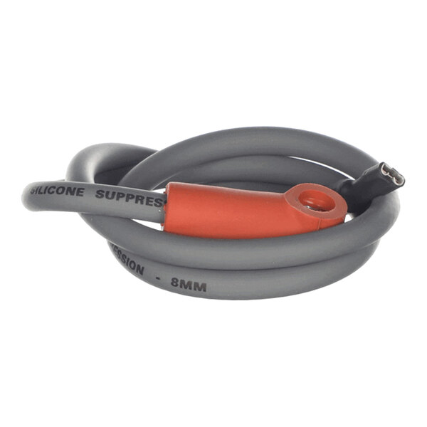 A coiled gray cable with a red connector and visible printed text on the cable.