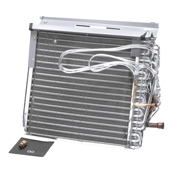 A metal A-shaped coil assembly with attached tubing and a small accessory part placed on a black pad.