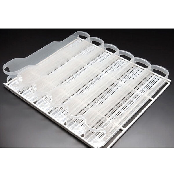 A white plastic tray with plastic tube holders.