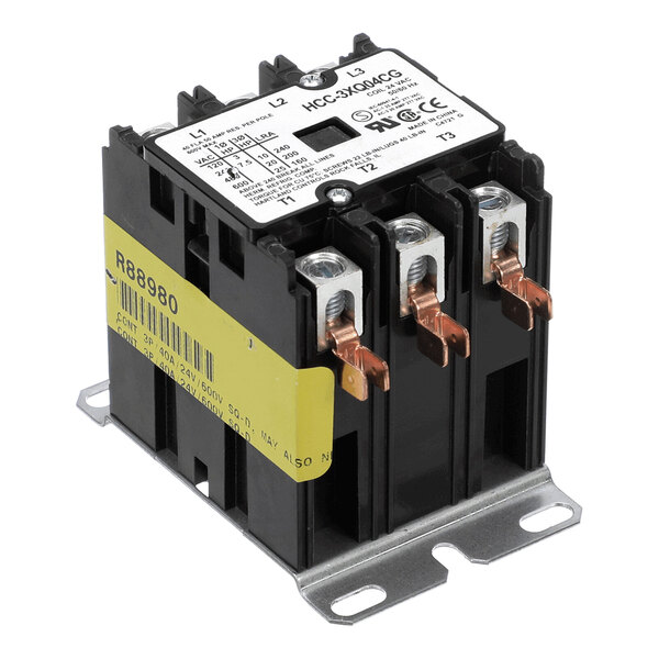 A black and silver electrical contactor with three copper terminals and a metal mounting base, featuring a white label with technical specifications and a yellow sticker on the side.
