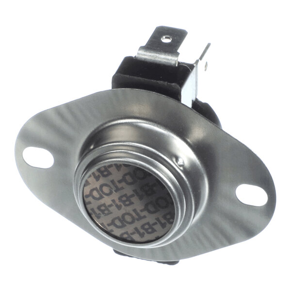 A metal component with a circular center, two mounting holes, and electrical terminals, likely a type of limit switch or control device.