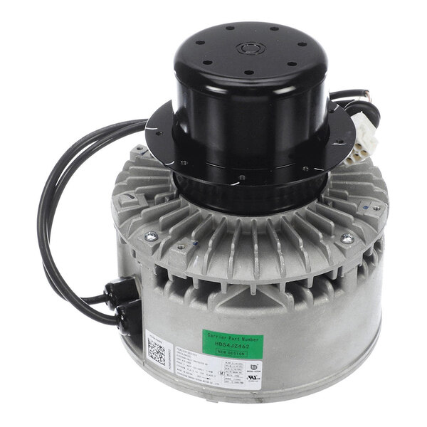 A cylindrical electric motor with a black top housing, metallic cooling fins, attached wiring, and a label on the side.
