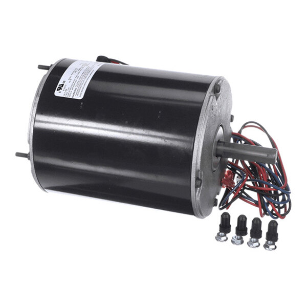 A cylindrical electric motor with attached wiring and four mounting bolts placed beside it.
