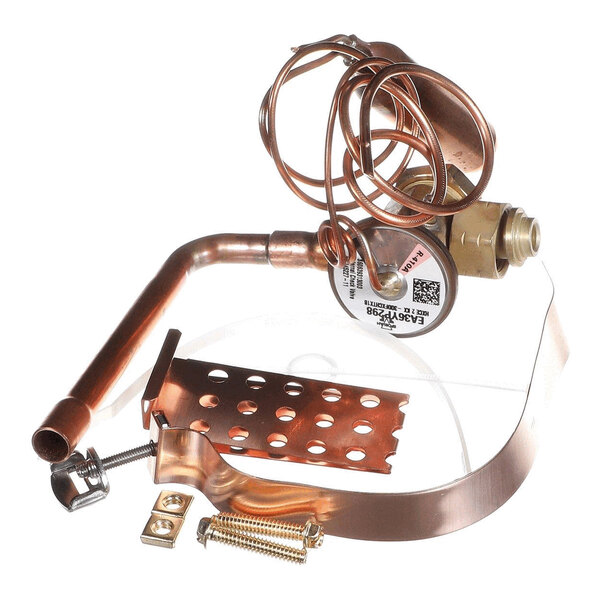 A collection of copper and brass mechanical components, including a coiled tube, valve, bracket, and mounting hardware, arranged on a white background.