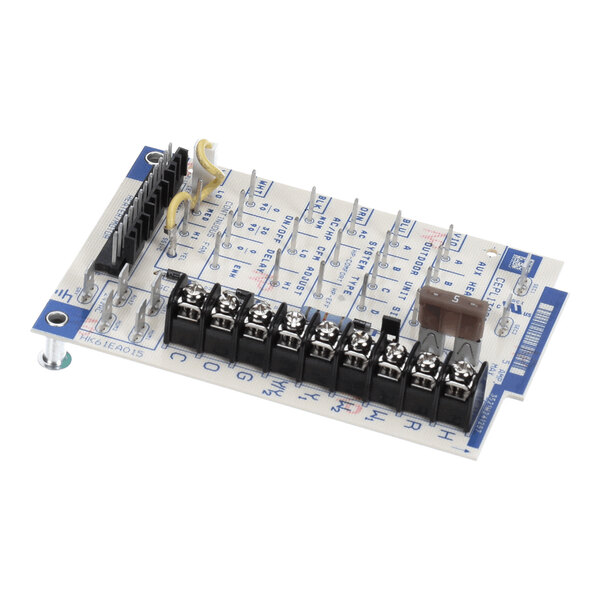 A rectangular electronic circuit board with multiple screw terminals, pin connectors, and labeled components mounted on its surface.