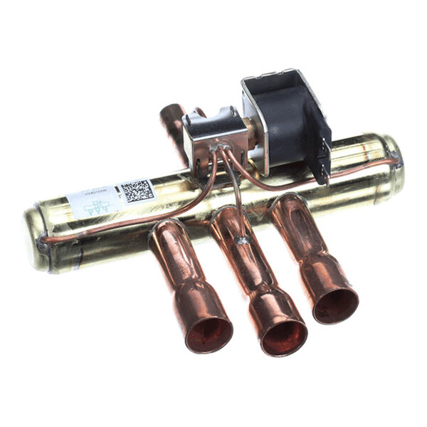 A metallic valve assembly with copper tubing and an attached black electrical coil component.