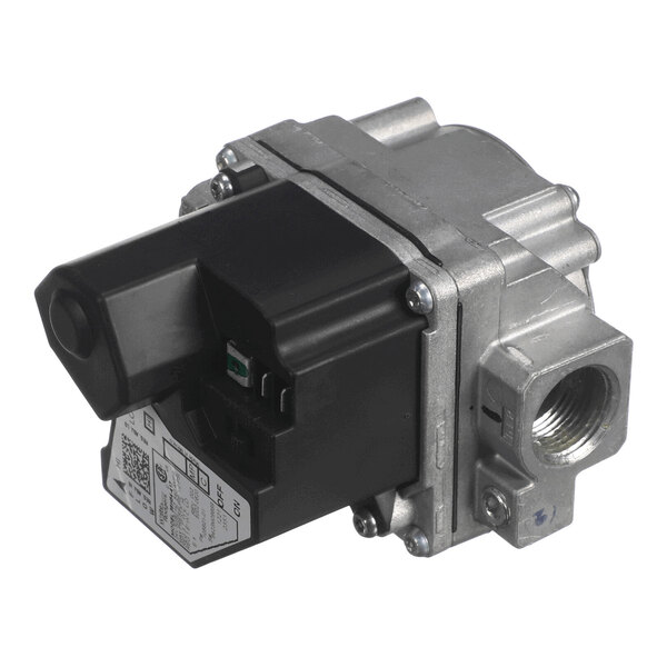 A metallic and black component with threaded pipe connections and an electrical connector, likely a gas valve.