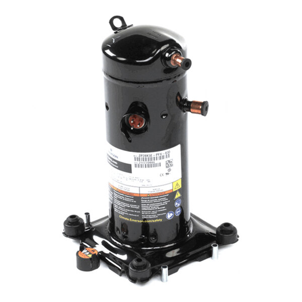 A black cylindrical mechanical component with copper pipe fittings and a label, mounted on a metal base.