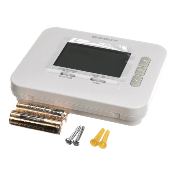 A digital thermostat with a display screen, two AA batteries, two screws, and two yellow wall anchors.