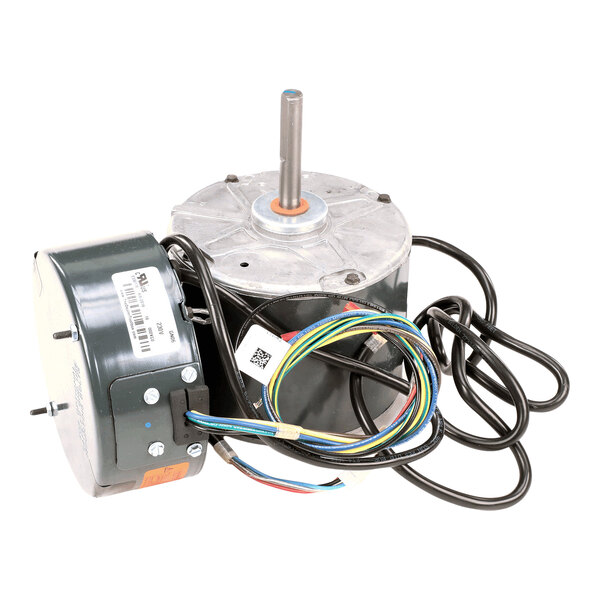A cylindrical electric motor with a central shaft, attached wires, and a label with barcodes.