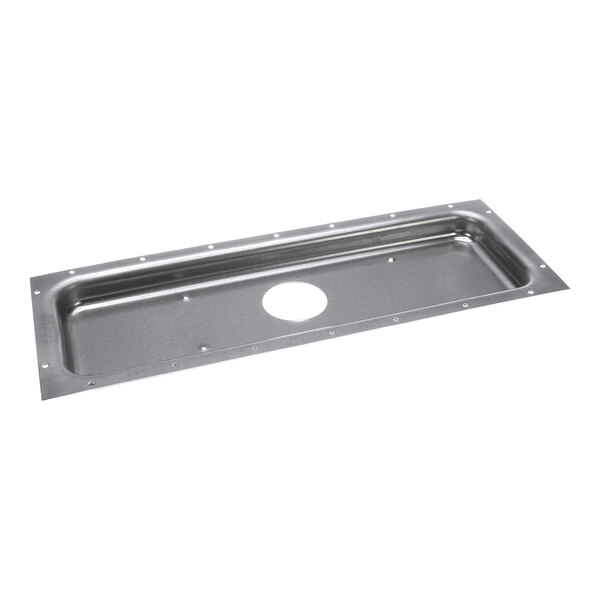 A rectangular metal panel with a raised edge, multiple small holes around the perimeter, and a large circular hole in the center.