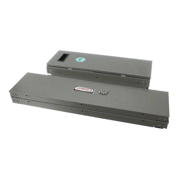 Two rectangular metal filter cabinets with a gray finish, one larger and one smaller, both with visible screws and labels on the top surfaces.