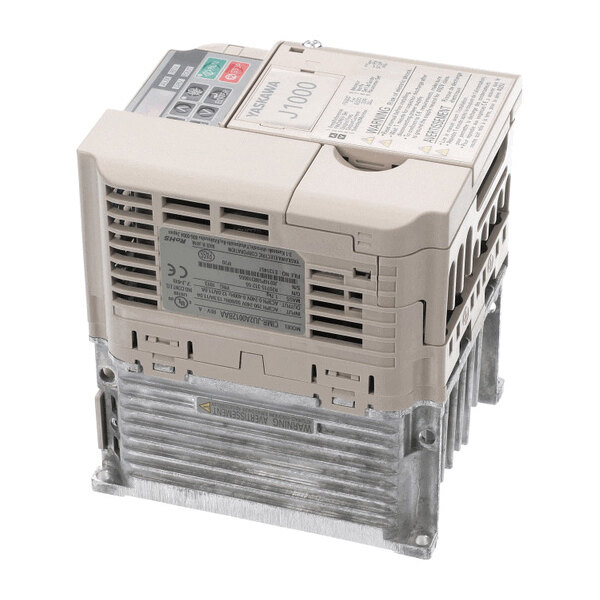 A beige and metallic industrial electronic device with ventilation slots, a label, and a finned heat sink at the bottom.