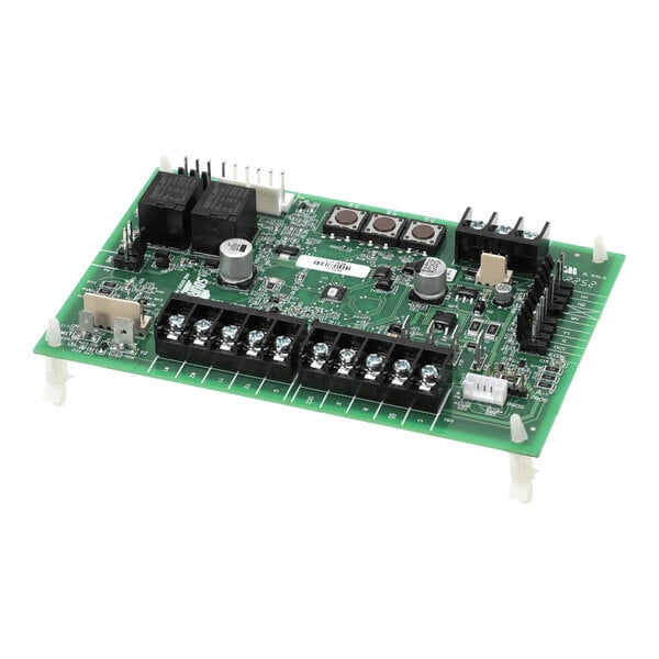 A green electronic circuit board with various components, including relays, capacitors, terminal blocks, buttons, and connectors, mounted on white standoffs.