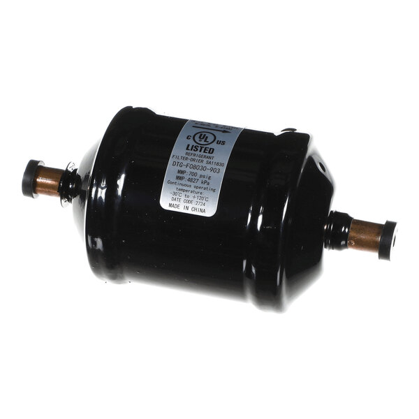 A cylindrical black metal component with copper fittings on both ends and a label on the side.