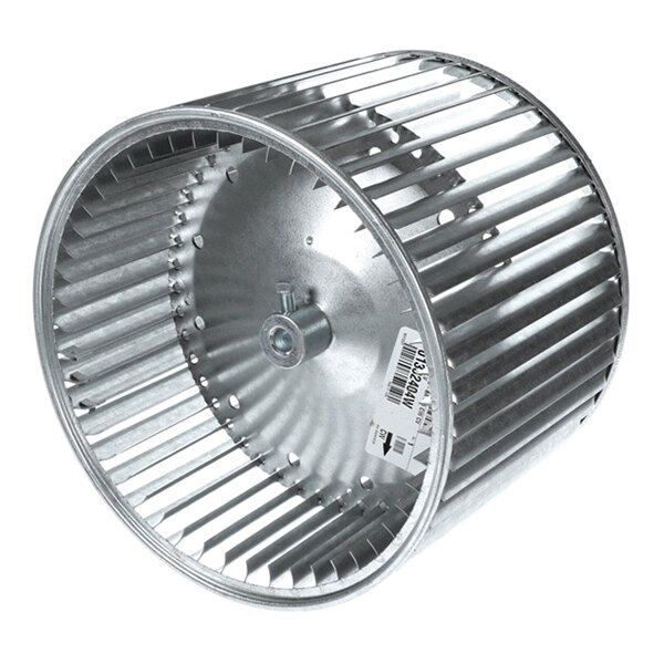 A cylindrical metal blower wheel with evenly spaced blades and a central hub, featuring a label on the inner side.