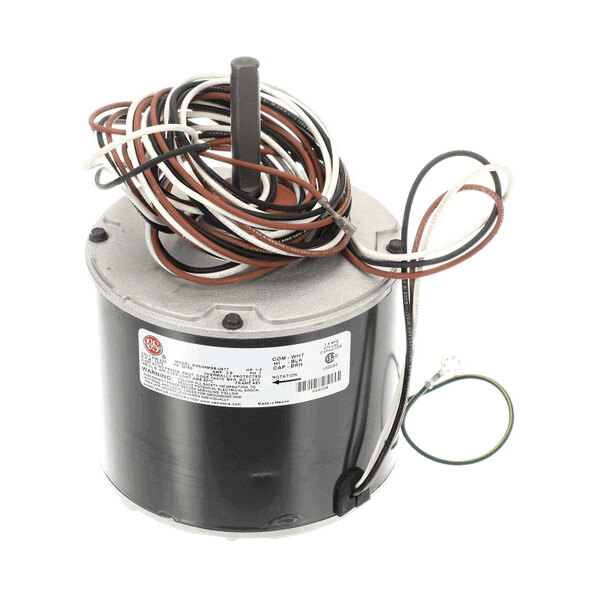 A cylindrical electric motor with a central shaft and several colored wires coiled on top and extending from the side.