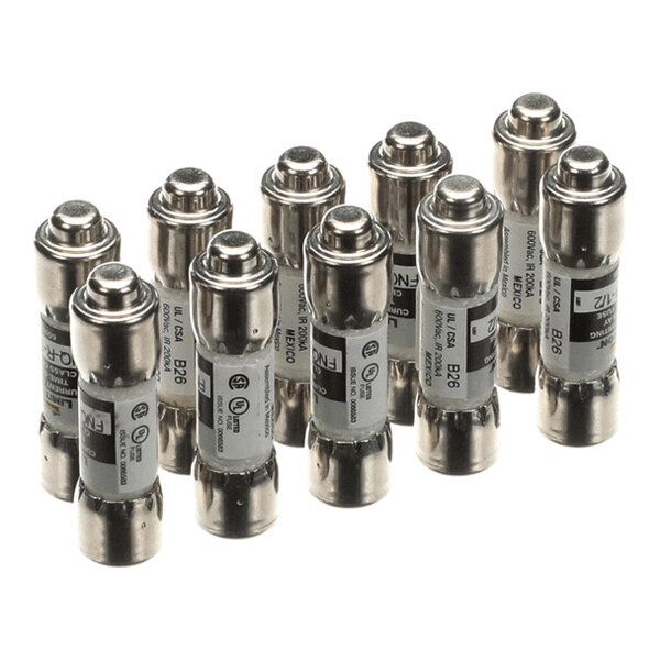 A group of cylindrical metal fuses with labels, arranged upright in rows.