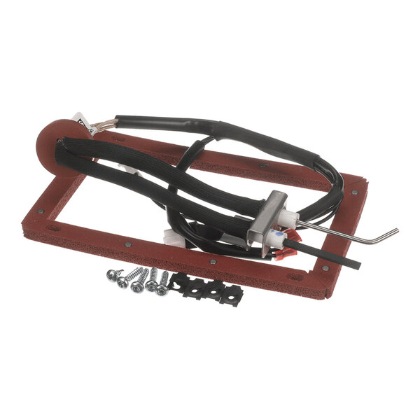A rectangular red frame with attached black cables, a metal component, screws, and mounting hardware.
