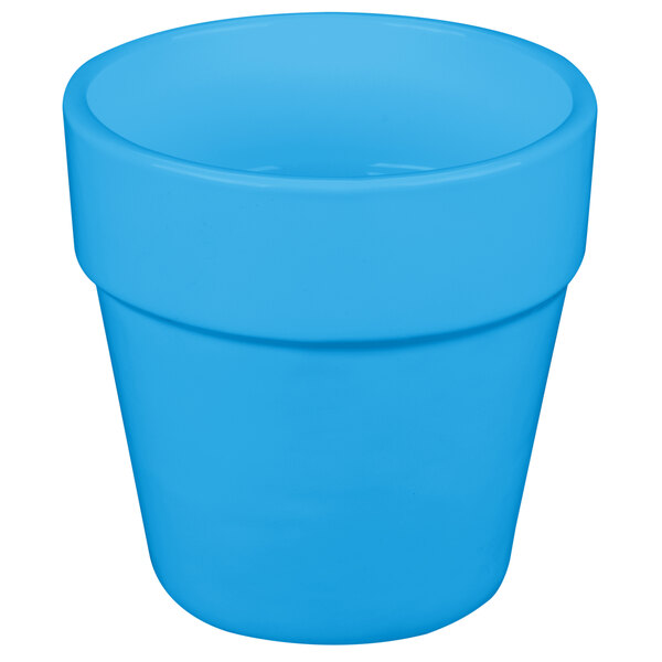 A sky blue cast aluminum round condiment bowl with a lid.