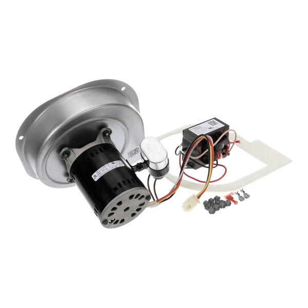 A metal blower assembly with an attached black motor, wiring, a transformer, and a small set of screws and connectors.