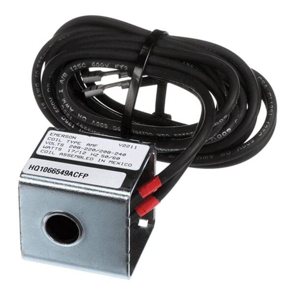 A metal electrical coil with a label and attached black wires coiled neatly on top.
