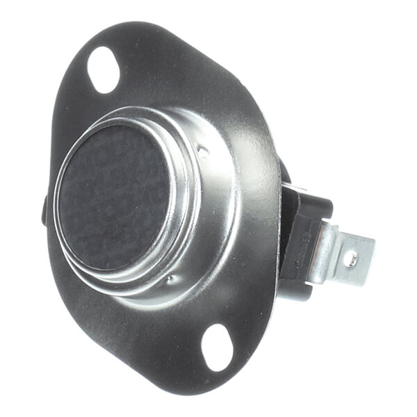 A round metallic component with two mounting holes and an electrical terminal on the side.