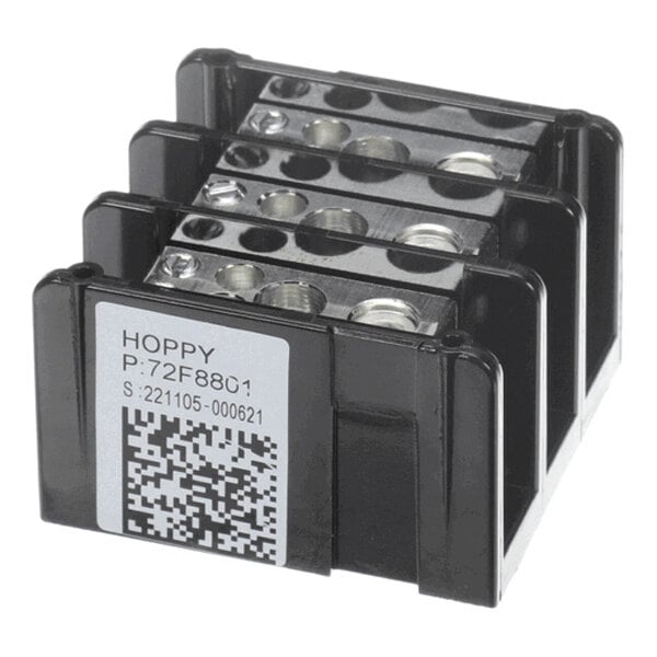 A black and silver three-position terminal block with a label and QR code on the side.
