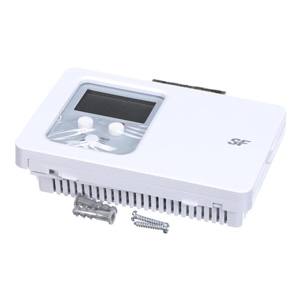 A white electronic device with a display screen, two control knobs, and ventilation slots, accompanied by screws and wall anchors.