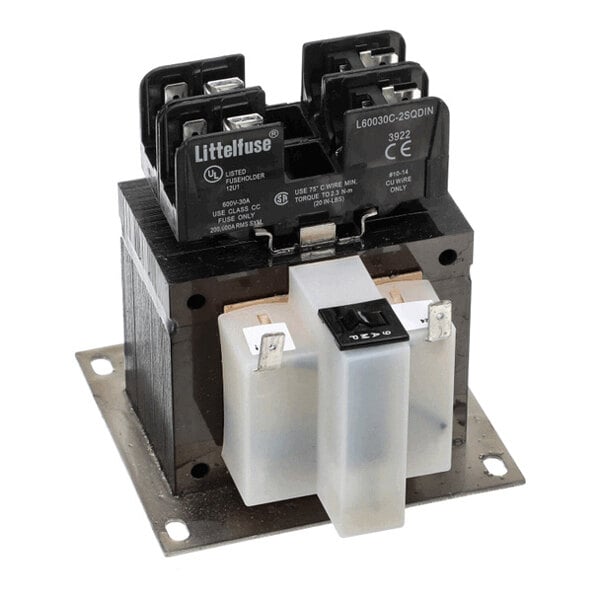 A black and white electrical transformer with fuse holders and terminal connections mounted on a metal base plate.