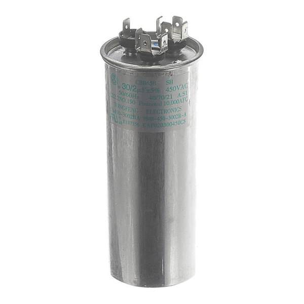 A cylindrical metallic component with multiple electrical terminals on top and printed specifications on the side, likely an electrical capacitor.