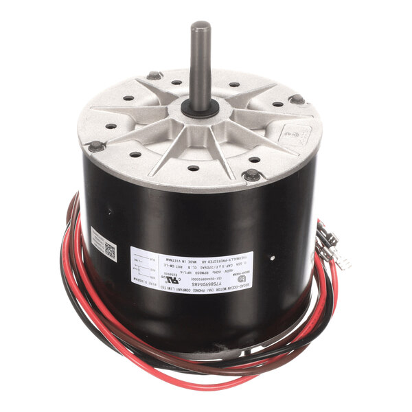 A cylindrical electric motor with a metal shaft protruding from the top, black housing, and attached red and black wires.