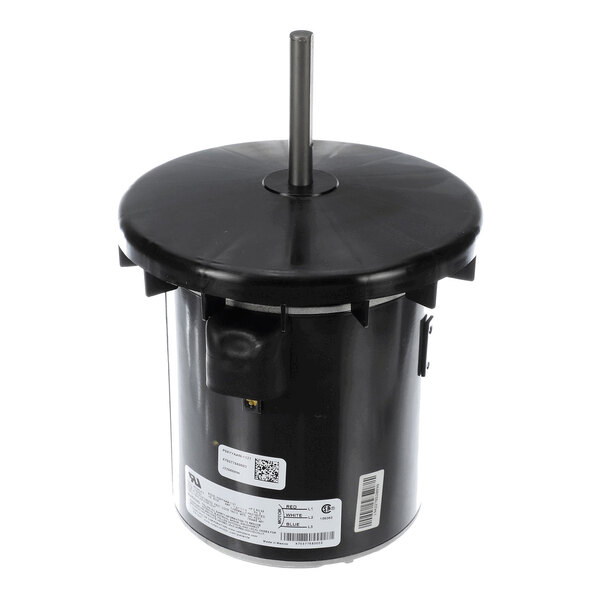 A cylindrical black electric motor with a central shaft extending vertically from the top and a label with specifications on the side.