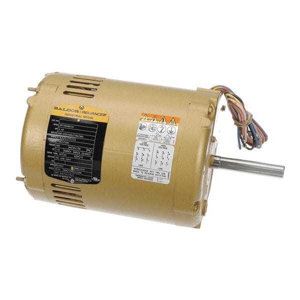 A cylindrical gold-colored electric motor with a protruding shaft, attached wiring, and multiple information labels on its body.