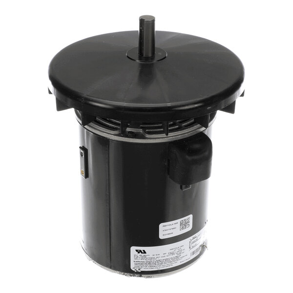 A cylindrical black electric motor with a round top cover and a central shaft protruding upward.