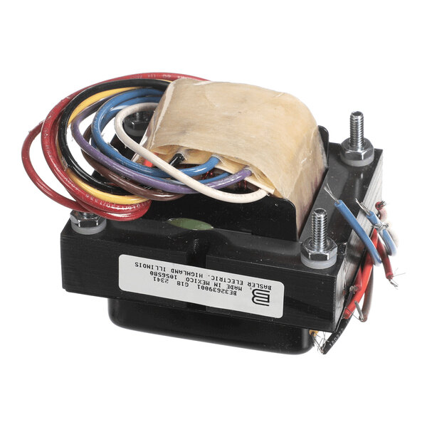 A rectangular electrical transformer with multiple colored wires and a label attached to its side.