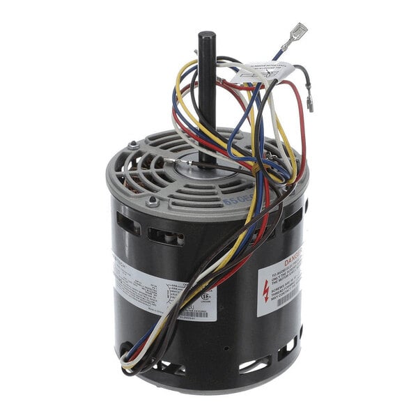 A cylindrical electric motor with multiple colored wires extending from the top and a central shaft.