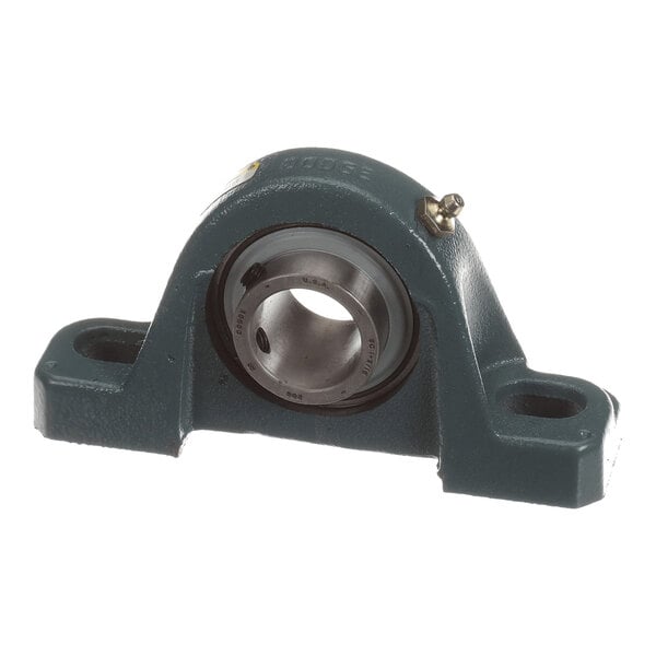 A metal pillow block bearing with a central cylindrical bore and two mounting holes on either side.