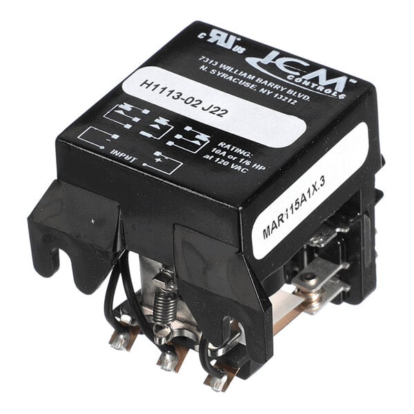 A black electrical relay with visible metal terminals and labeled markings on the top and side.
